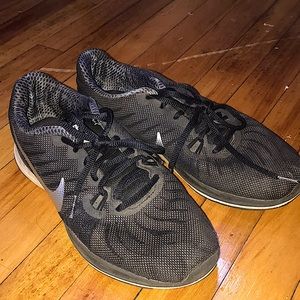 Black Nike running shoes